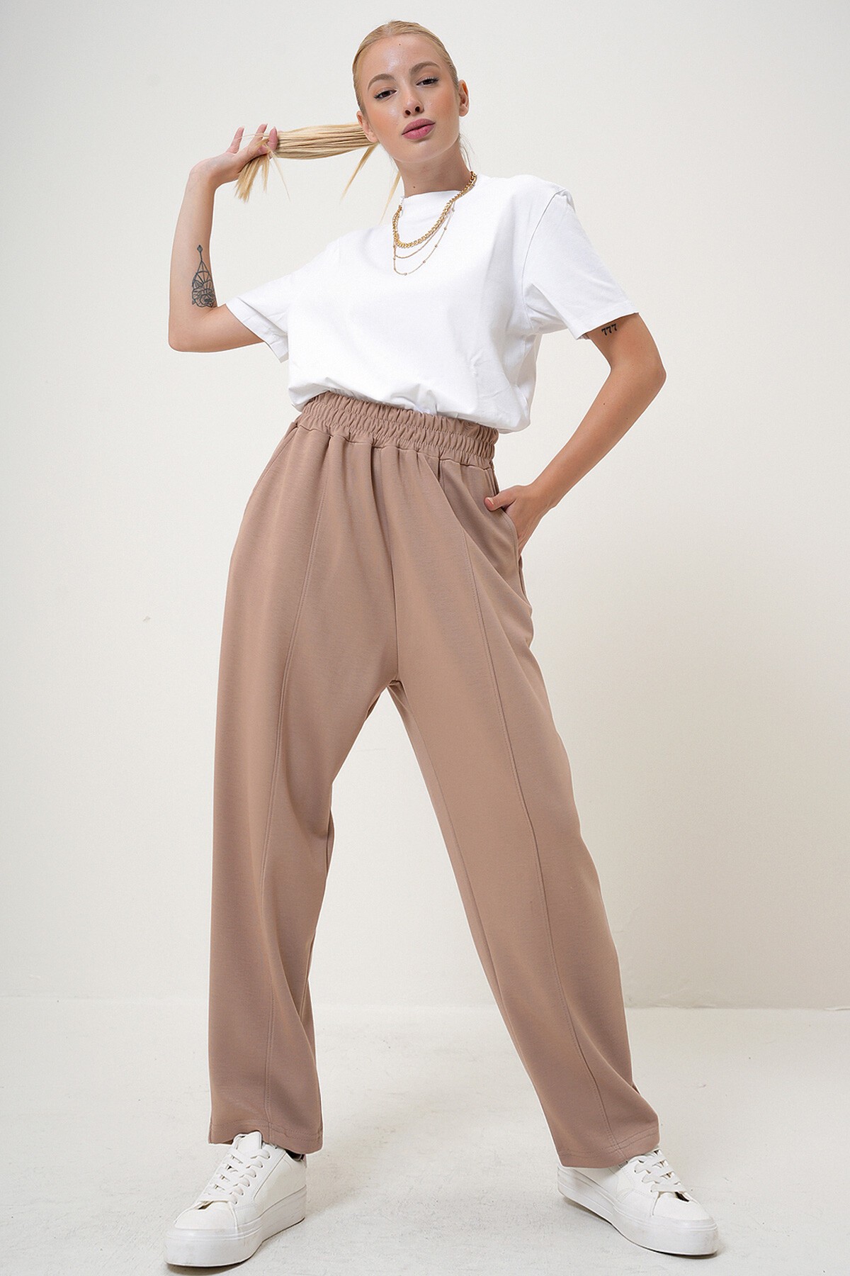 Bej Beli Lastikli Çift Cepli Şalvar Kesim Modal Pantolon
