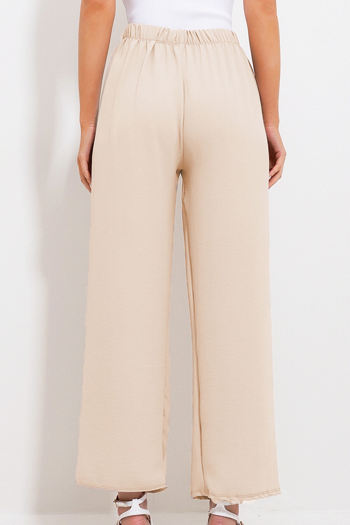Bej Beli Lastikli Rahat Kesim Aerobin Pantolon