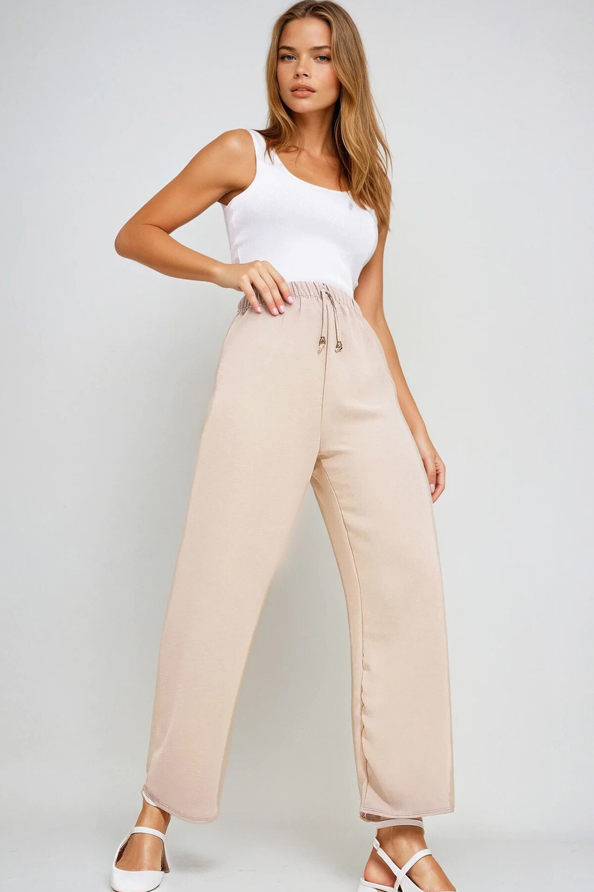 Bej Beli Lastikli Rahat Kesim Aerobin Pantolon