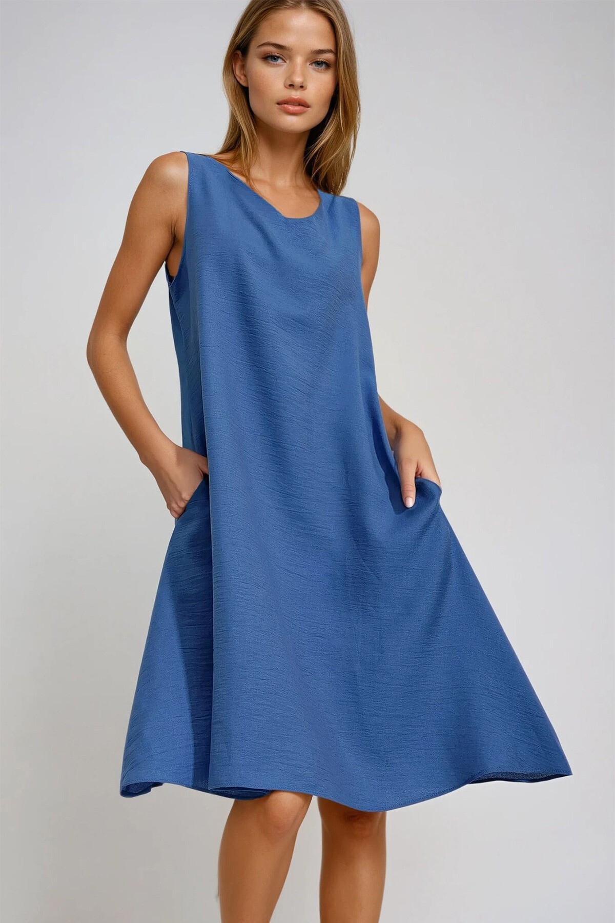 Saks V Yaka Çift Cepli Aerobin Dokuma Elbise