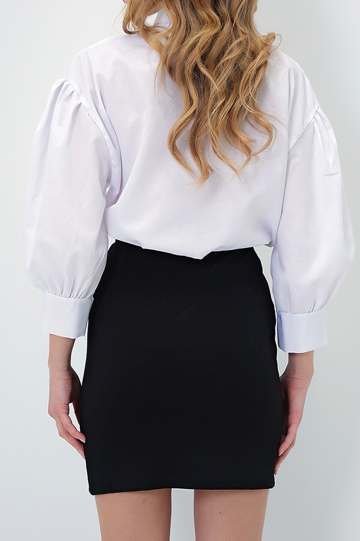 Siyah Çift Yırtmaçlı Likralı Örme Mini Etek