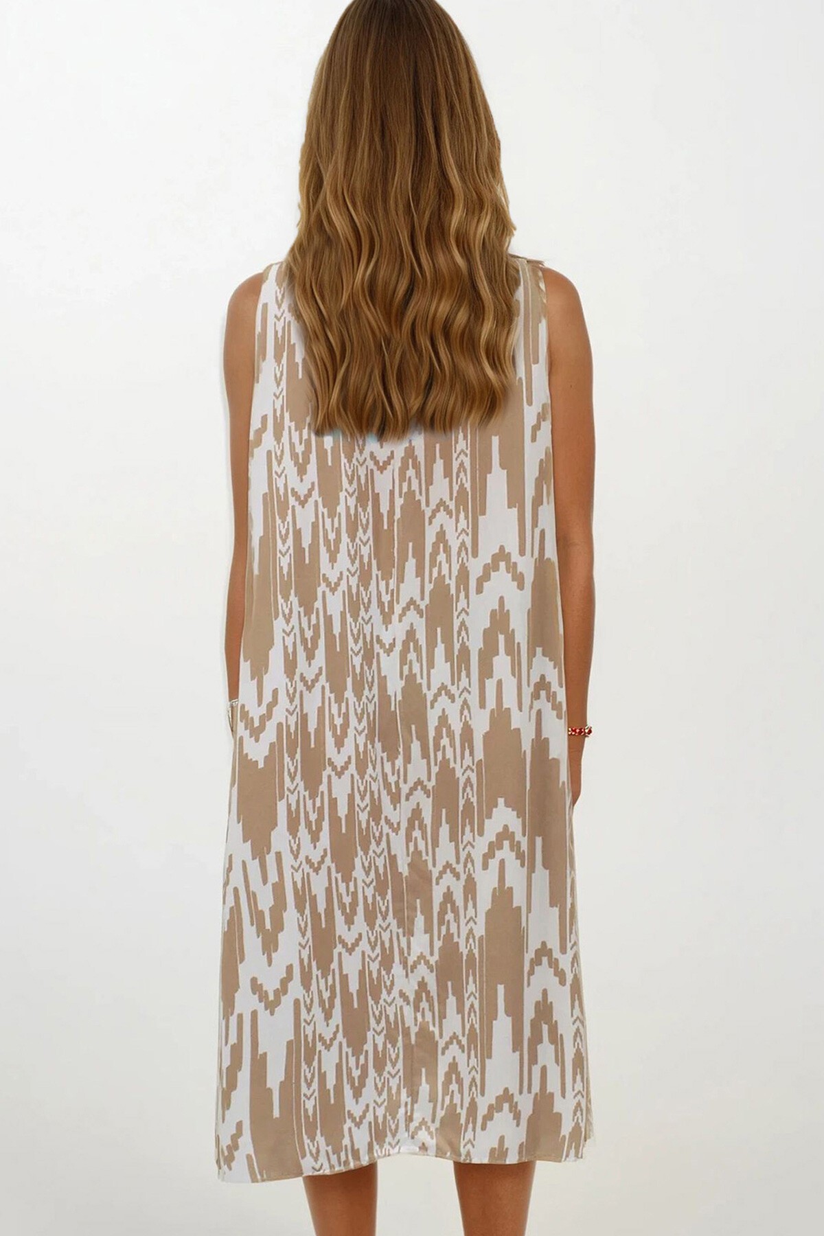 Bej Desenli Çift Cepli Kolsuz Rahat Kesim Elbise