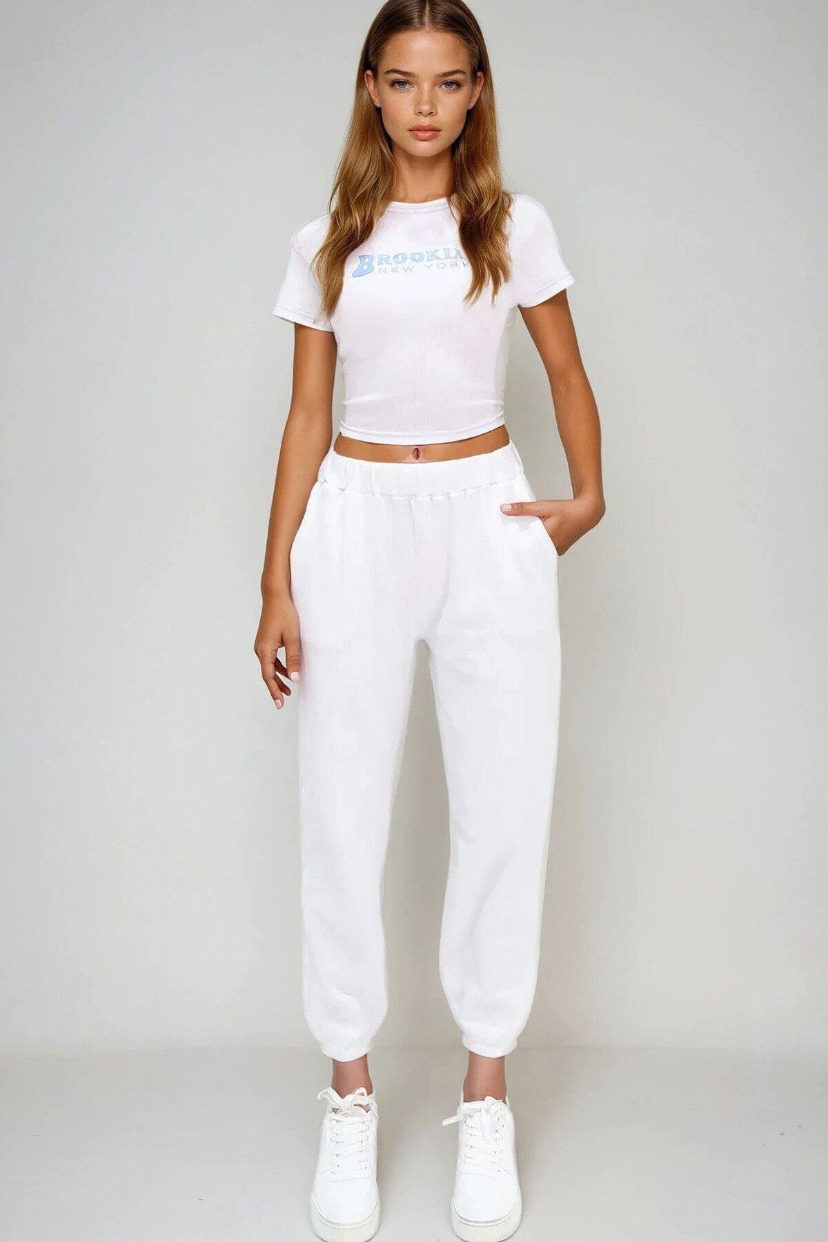 Beyaz Çift Cepli Beli Ve Paçası Lastikli Jogging Dokulu Pantolon