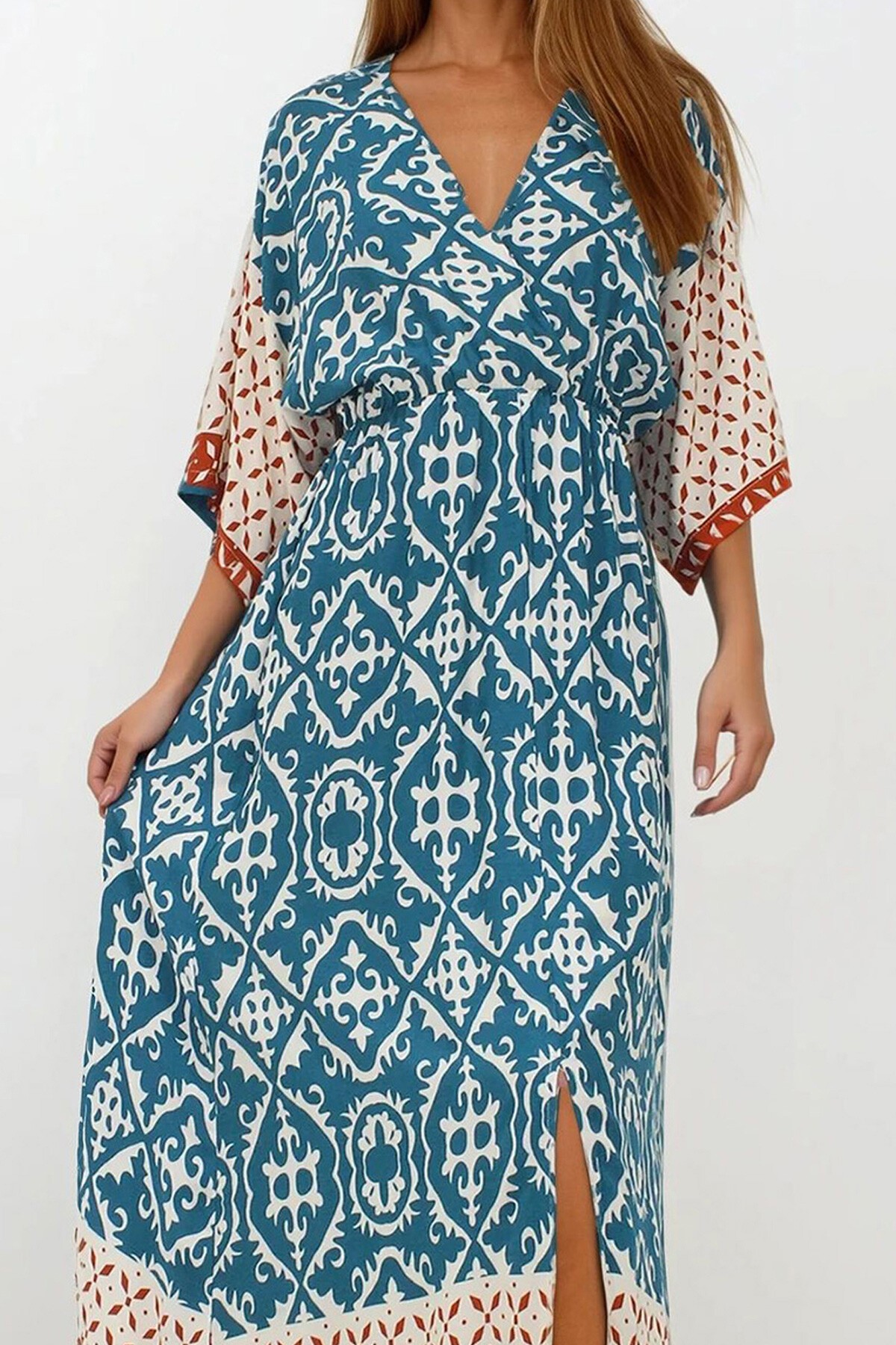 İndigo Kruvaze Yaka Beli Lastikli Yarasa Kol Yırtmaç Detaylı Dokuma Maxi Boy Elbise