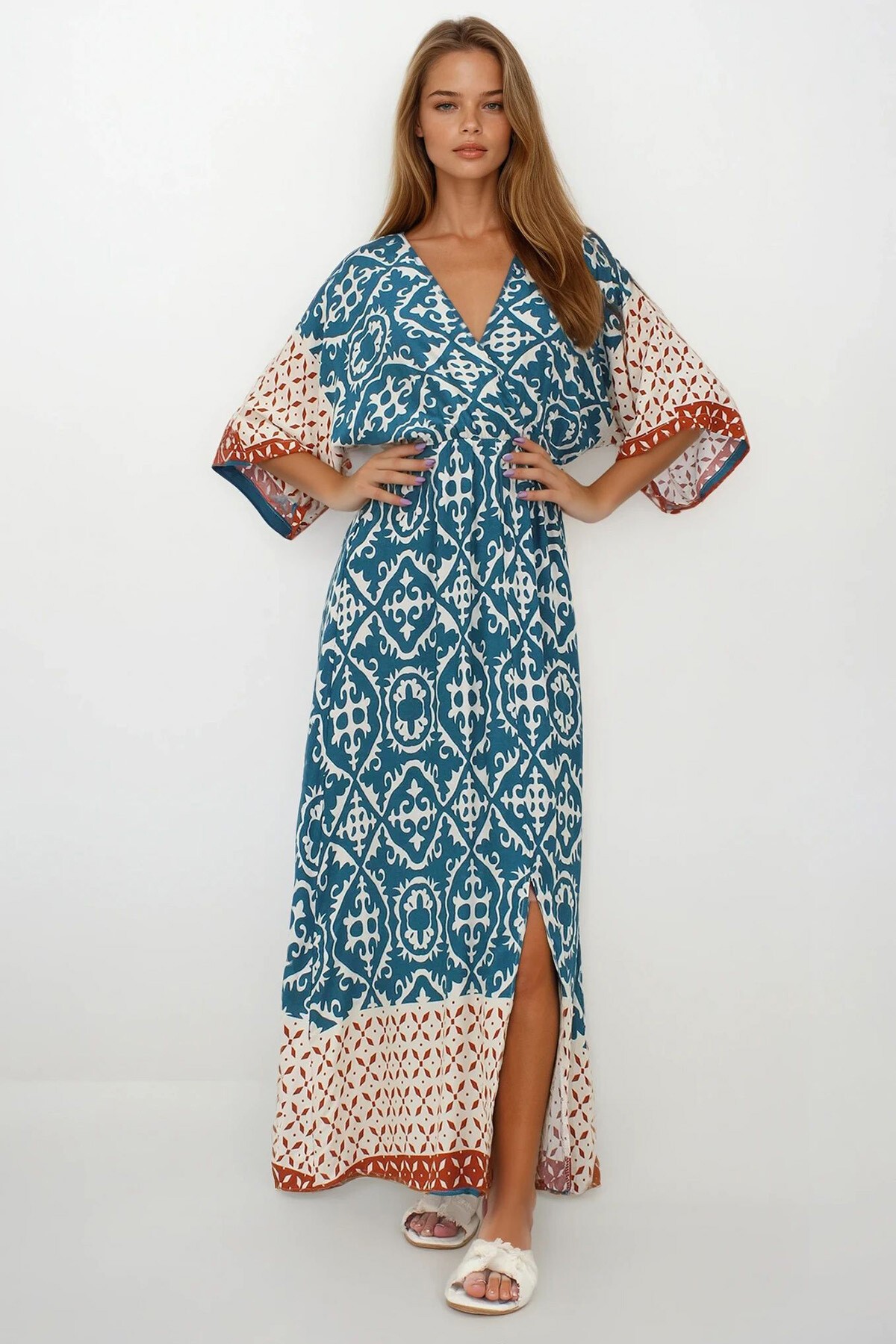 İndigo Kruvaze Yaka Beli Lastikli Yarasa Kol Yırtmaç Detaylı Dokuma Maxi Boy Elbise