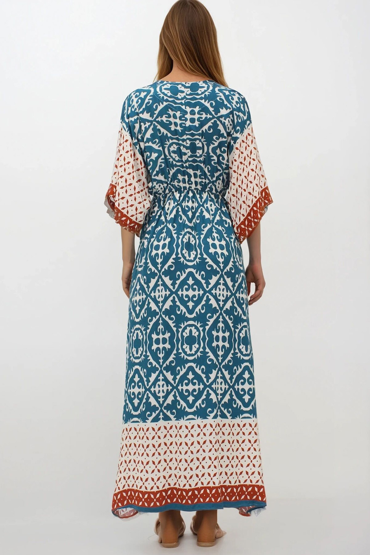 İndigo Kruvaze Yaka Beli Lastikli Yarasa Kol Yırtmaç Detaylı Dokuma Maxi Boy Elbise