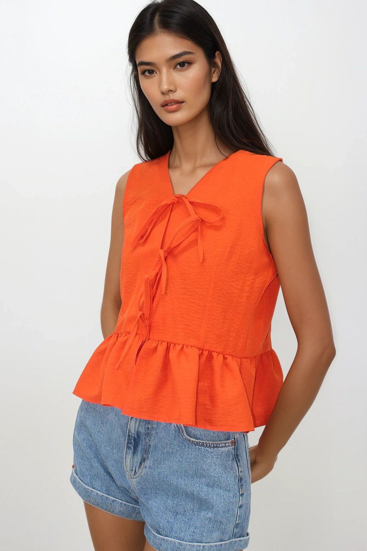 Turuncu V Yaka Fiyonk Detaylı Eteği Volanlı Aerobin Bluz