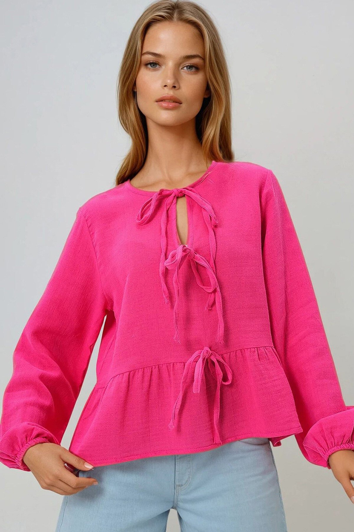 Fuşya Geniş Yaka Önden Bağlamalı Eteği Volanlı Dokuma Bluz