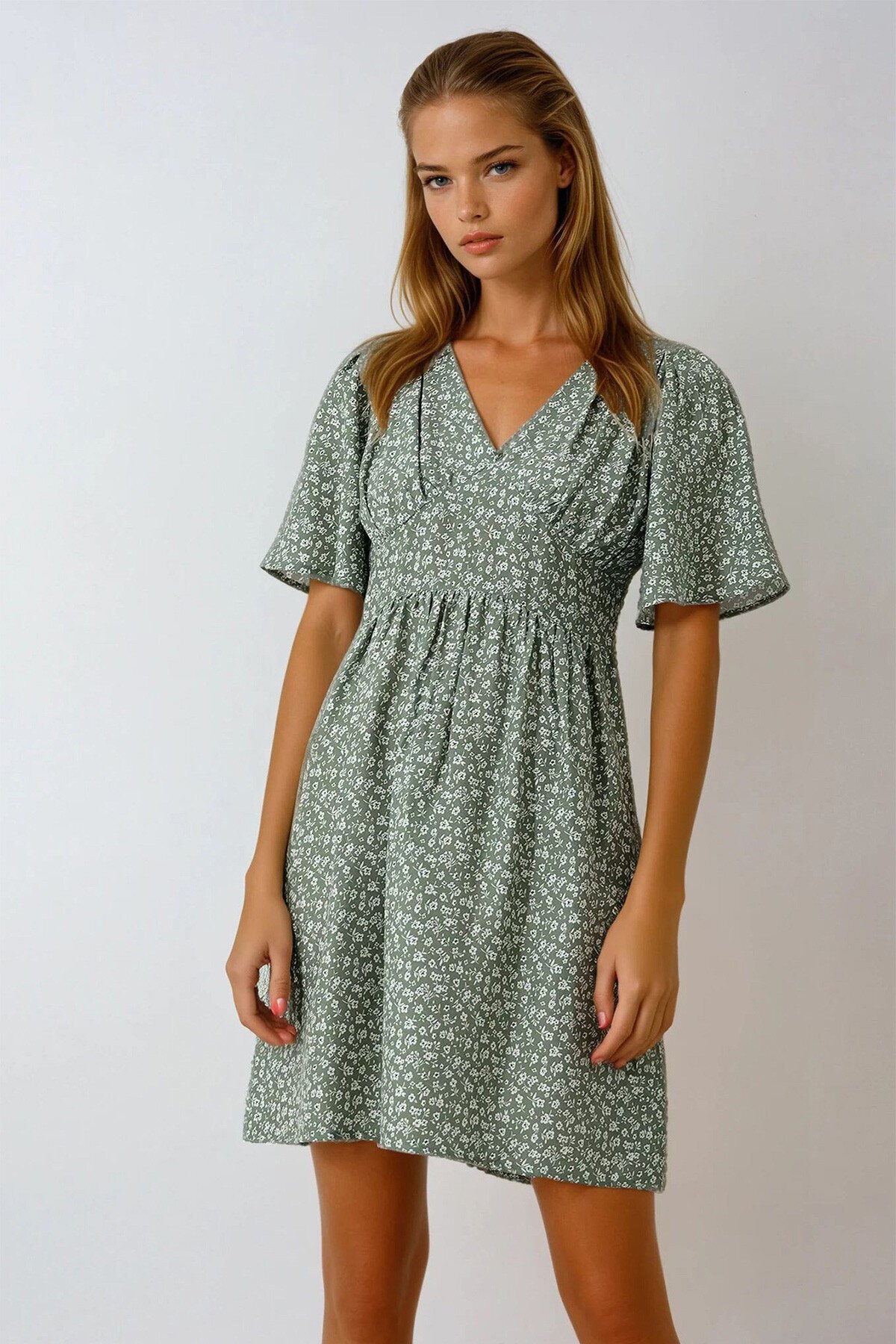 Haki V Yaka Kısa Kol Çiçek Desenli Eteği Volanlı Dokuma Elbise