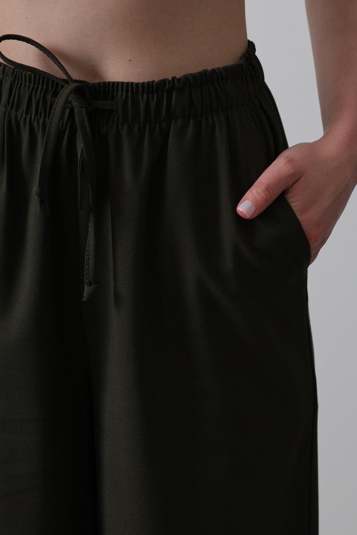 Koyu Haki Çift Cepli Beli Lastikli Bol Paça Pantolon