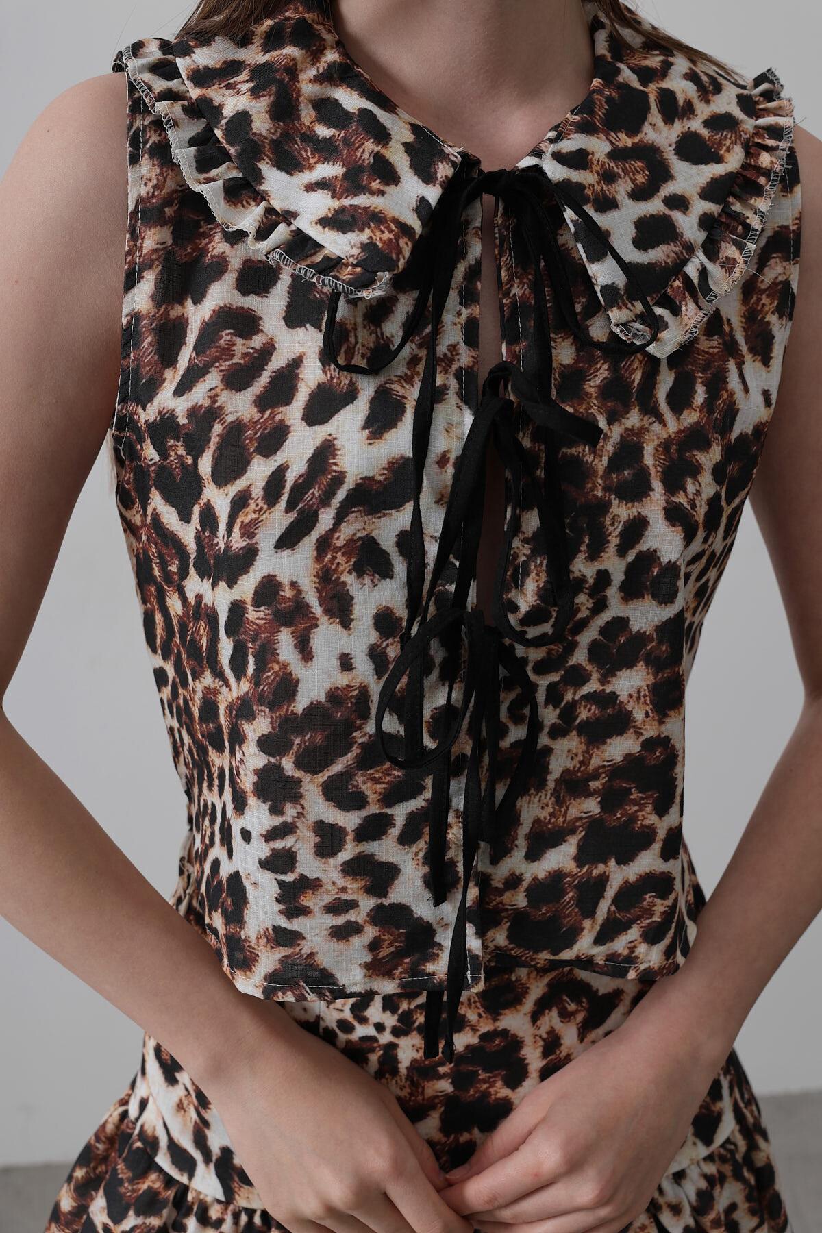 Leopar Bebe Yaka Fiyonk Detaylı Leopar Bluz