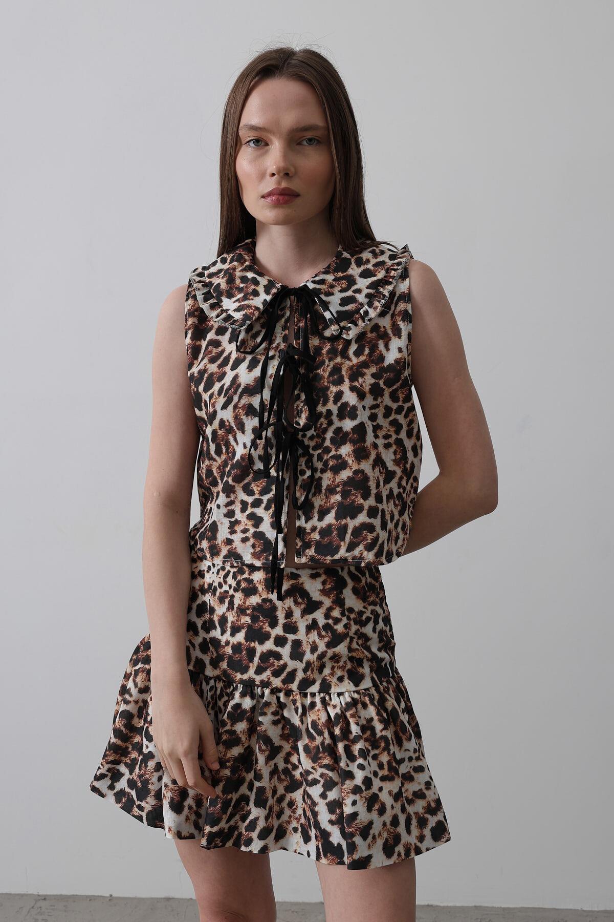 Leopar Bebe Yaka Fiyonk Detaylı Leopar Bluz