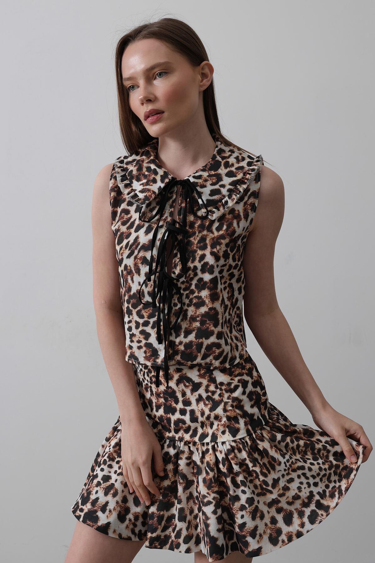 Leopar Bebe Yaka Fiyonk Detaylı Leopar Bluz