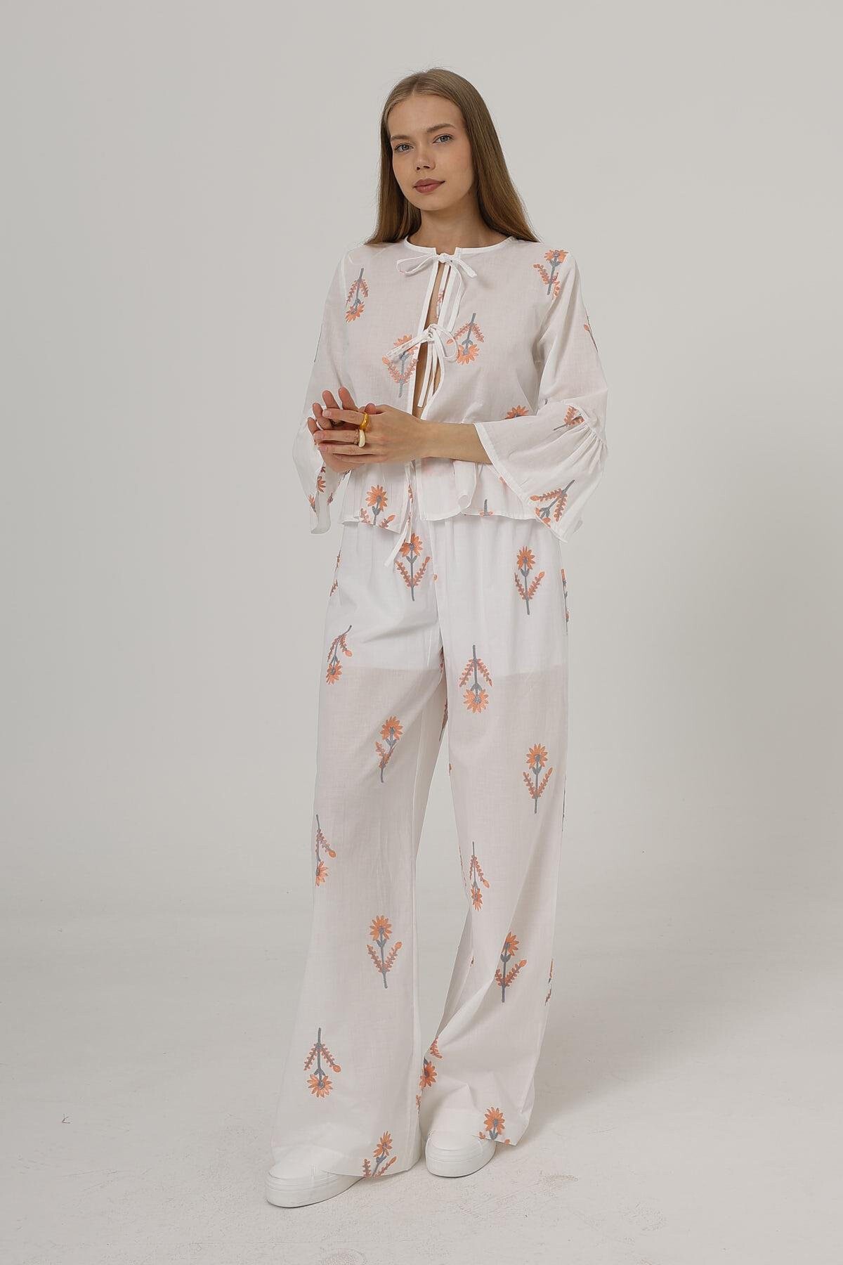 Beyaz Kendinden İşlemeli Astarlı Rahat Kesim Pantolon