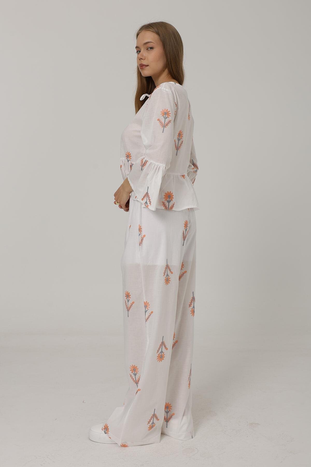 Beyaz Kendinden İşlemeli Astarlı Rahat Kesim Pantolon