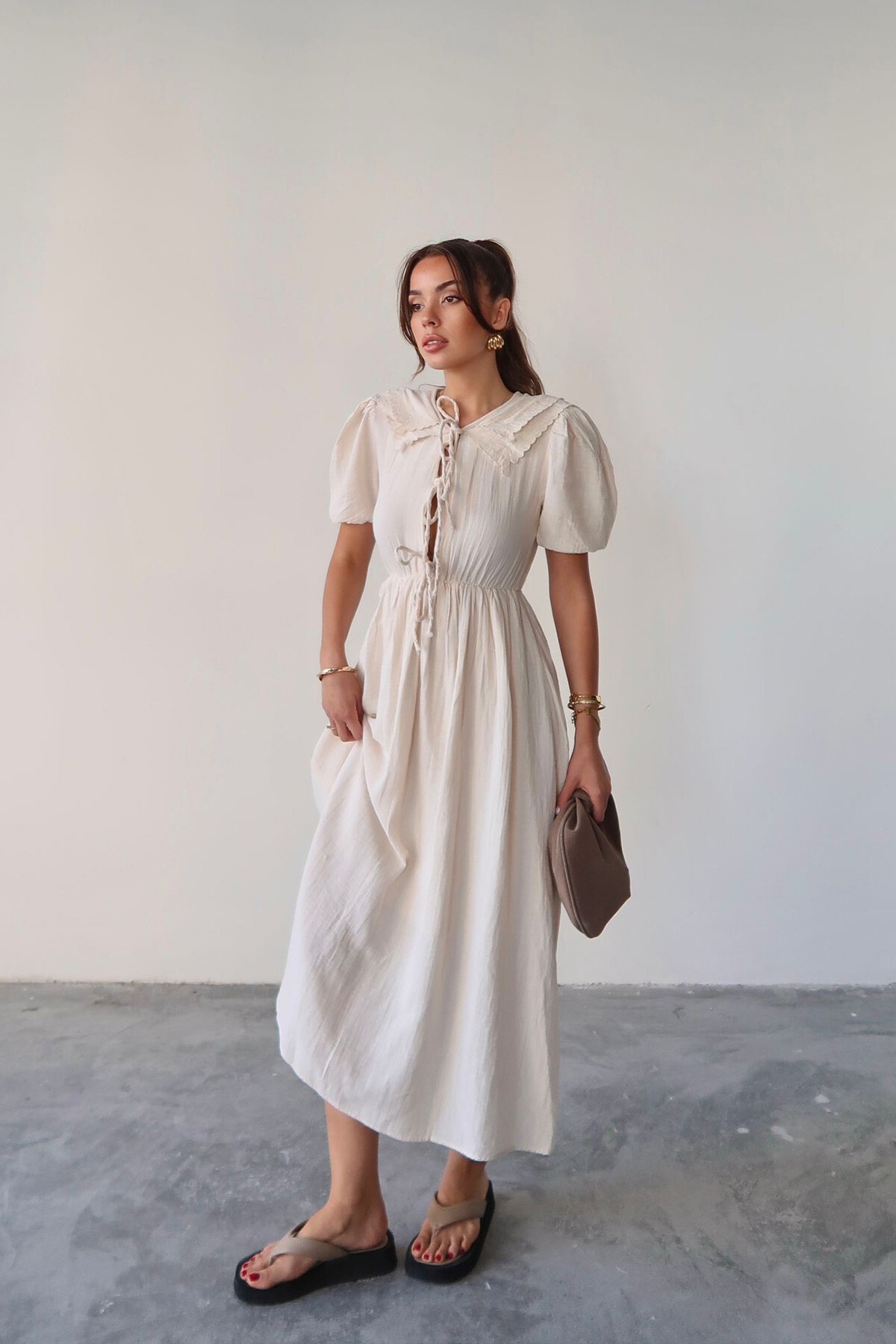 Krem Bebe Yaka Bağlamalı Astarlı Uzun Müslin Elbise