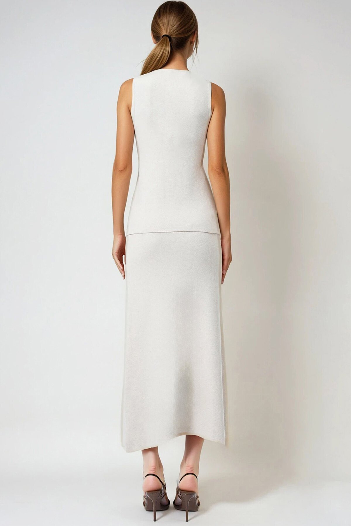 Aksesuar Düğmeli Yelek Ve Maxi Boy Etek Triko Takım