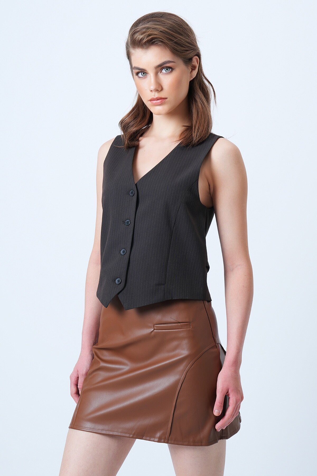 Fileto Cep Ve Dikiş Detaylı Yandan Fermuarlı Suni Deri Etek