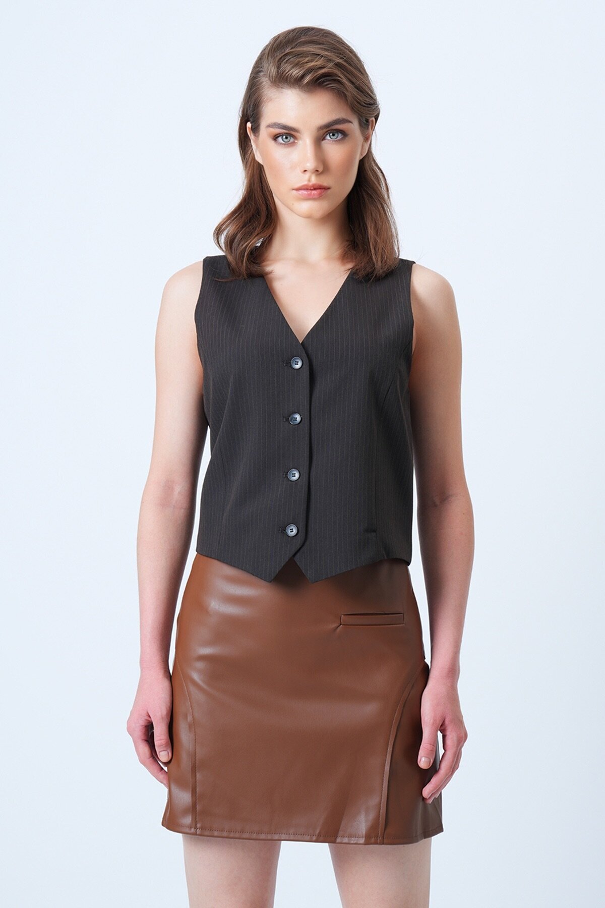 Fileto Cep Ve Dikiş Detaylı Yandan Fermuarlı Suni Deri Etek