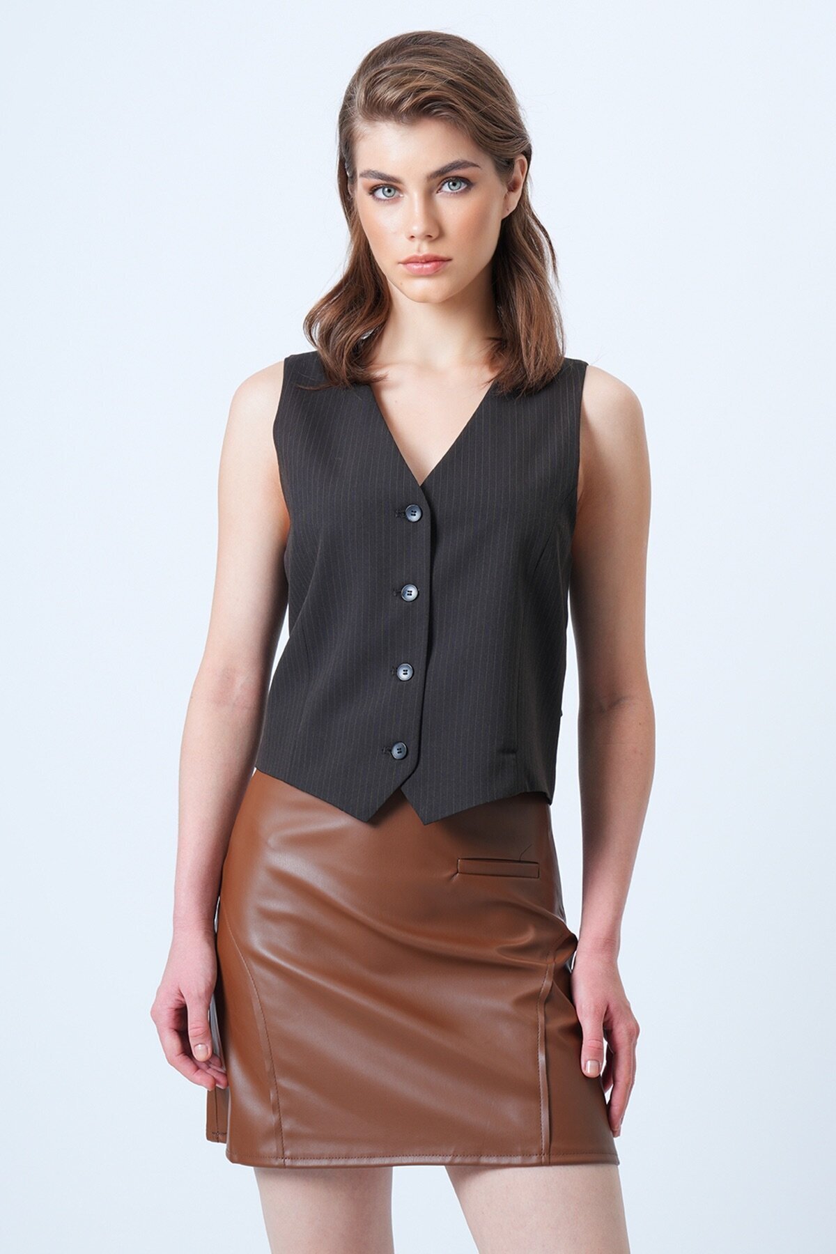 Fileto Cep Ve Dikiş Detaylı Yandan Fermuarlı Suni Deri Etek