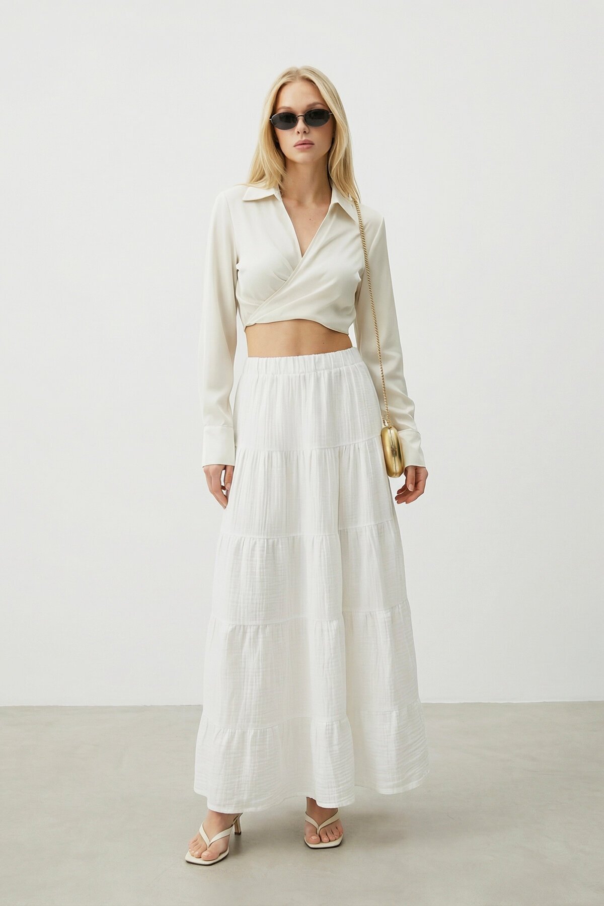 Beli Lastikli Katlı Midi Etek