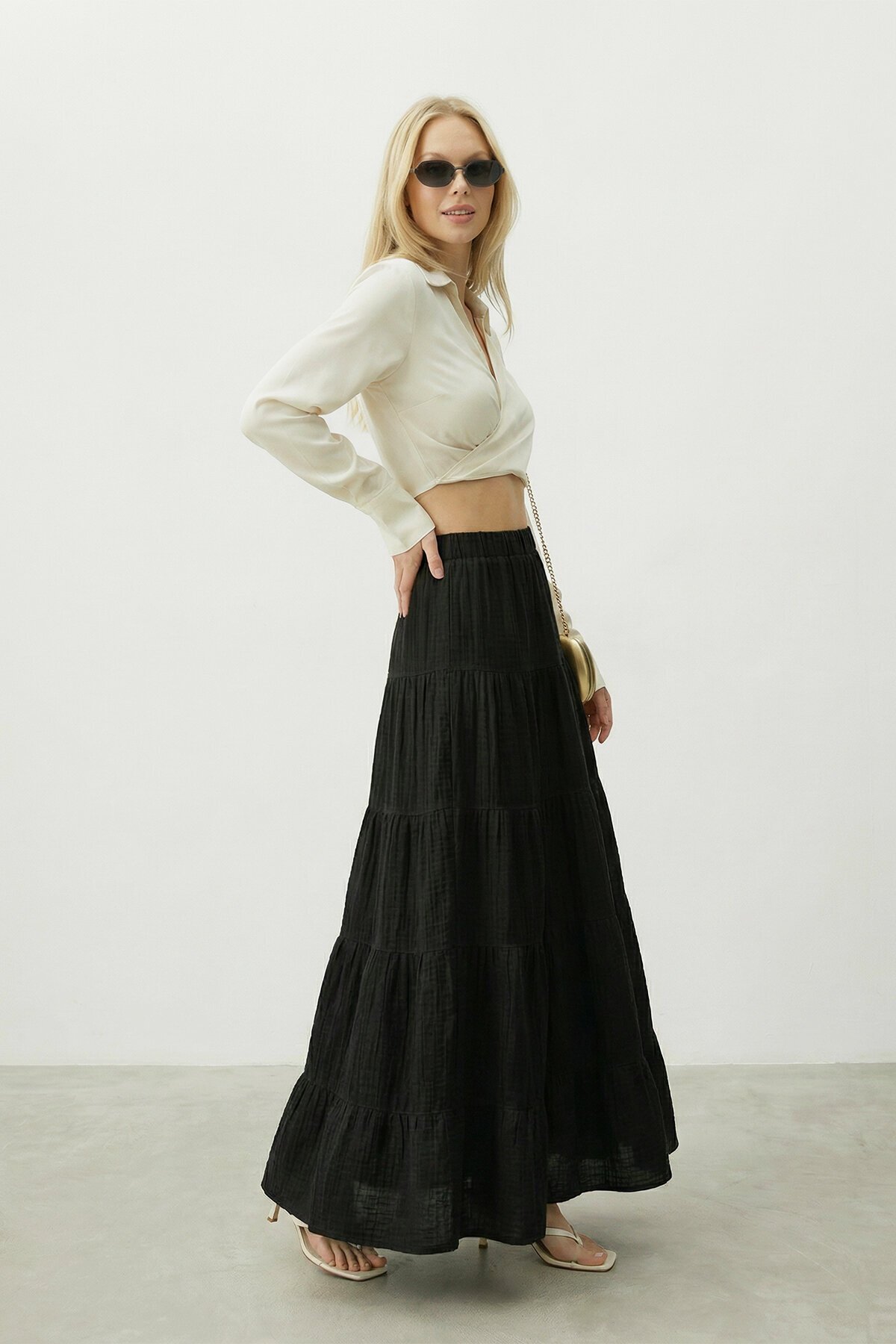 Beli Lastikli Katlı Midi Etek