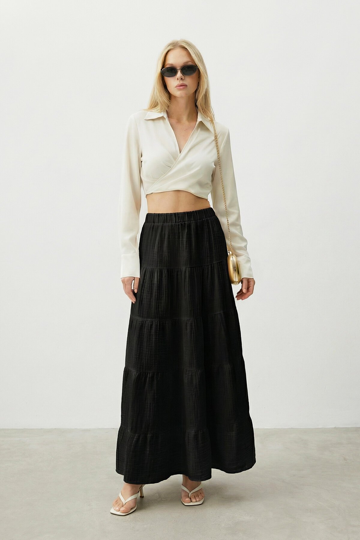 Beli Lastikli Katlı Midi Etek