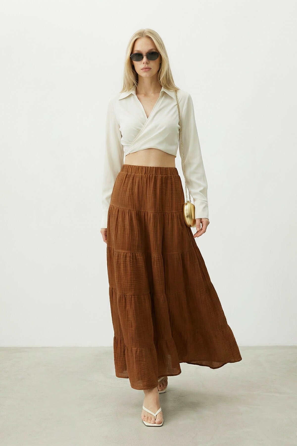 Beli Lastikli Katlı Midi Etek