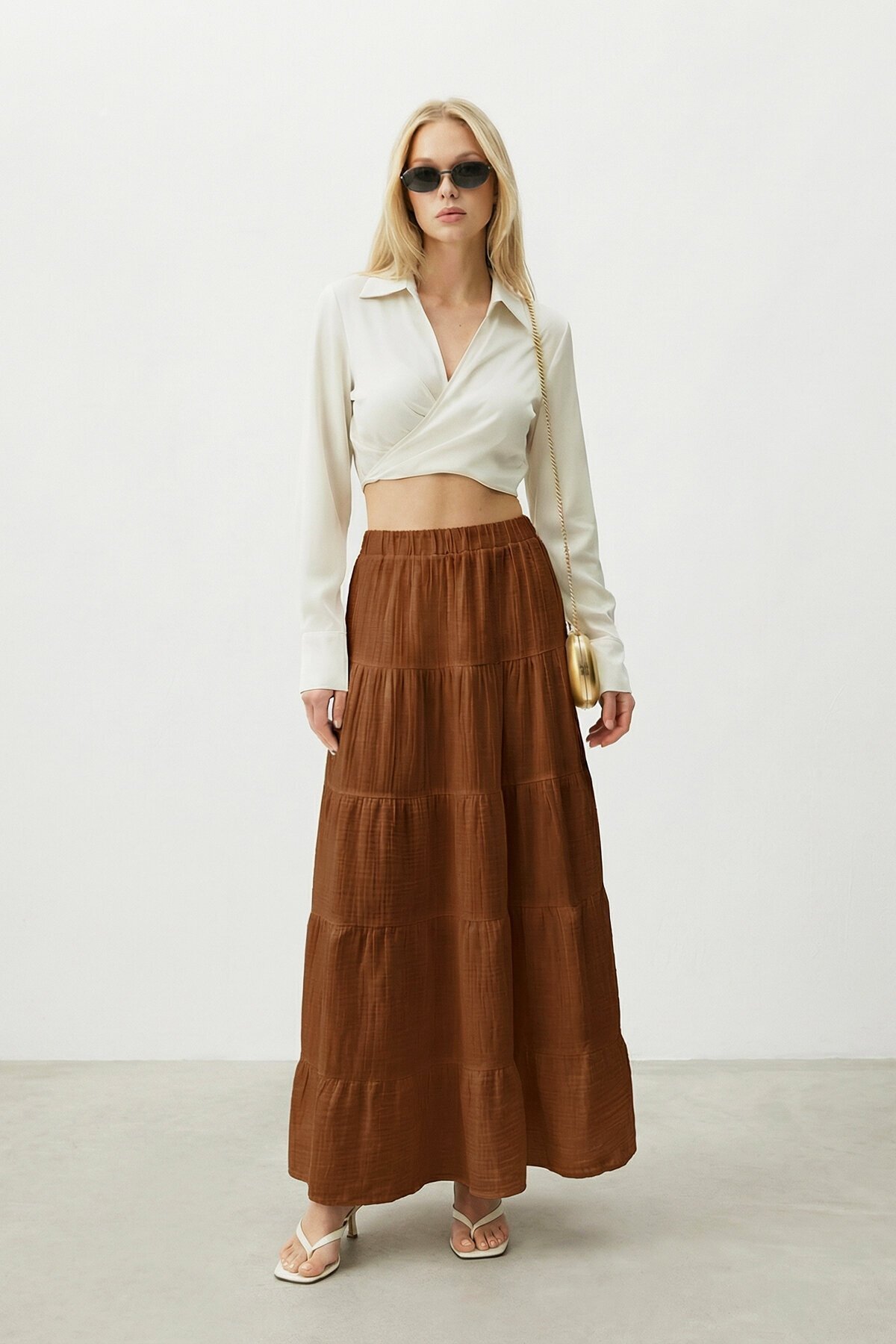 Beli Lastikli Katlı Midi Etek