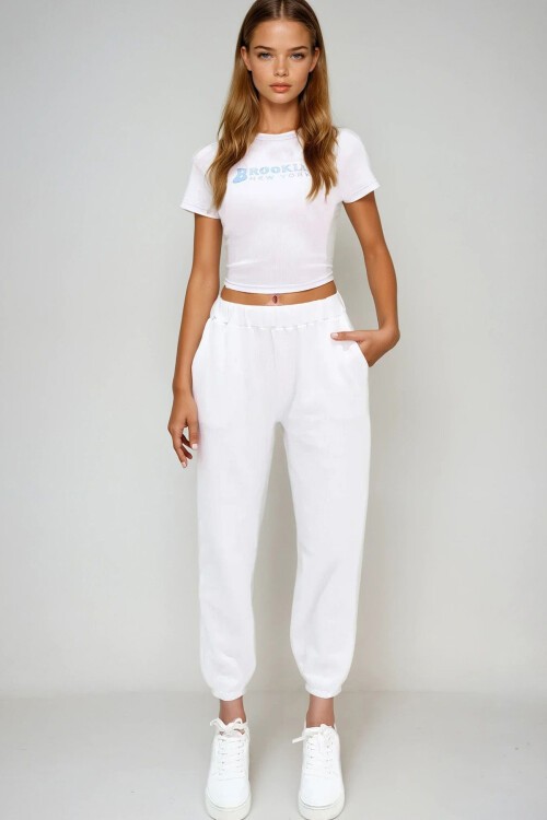 Beyaz Çift Cepli Beli Ve Paçası Lastikli Jogging Dokulu Pantolon