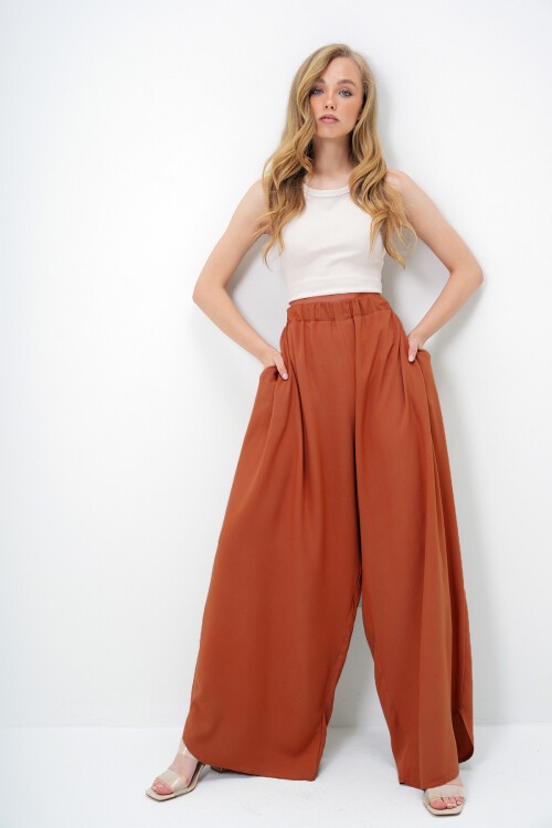 Kiremit Çift Cepli Dökümlü Bol Kesim Dokuma Pantolon