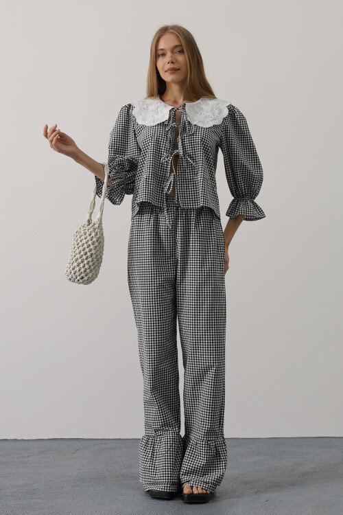 Siyah Bağlama Detaylı Kolları Lastikli Bluz Ve Pantolon Takım