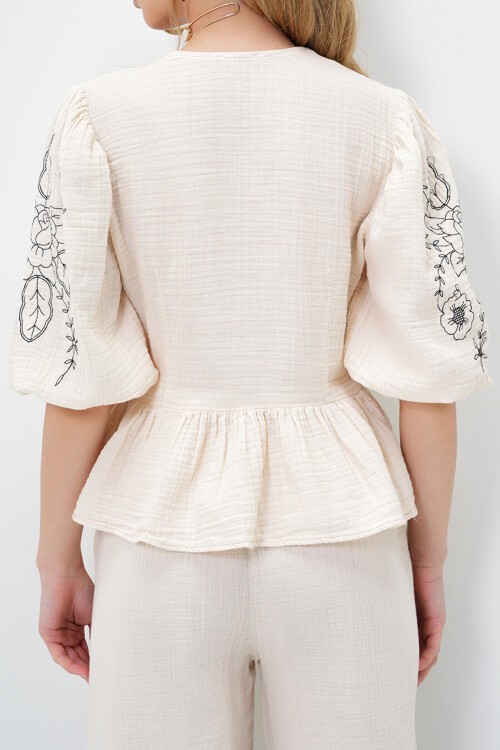 Ekru V Yaka Bağlama Ve Nakış Detaylı Eteği Volanlı Müslin Keten Bluz