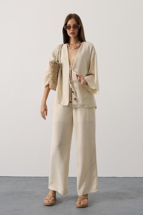 Taş Bağlama Detaylı Bluz Ve Beli Lastikli Pantolon Keten Takım