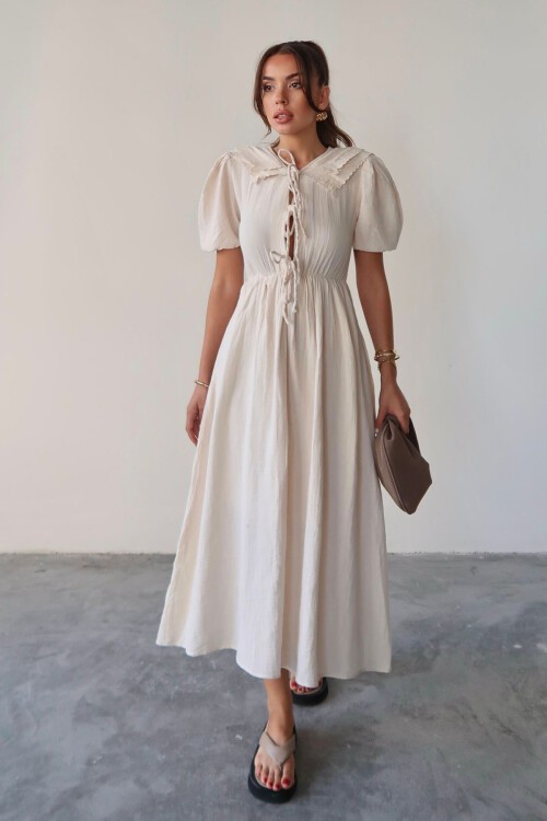 Krem Bebe Yaka Bağlamalı Astarlı Uzun Müslin Elbise