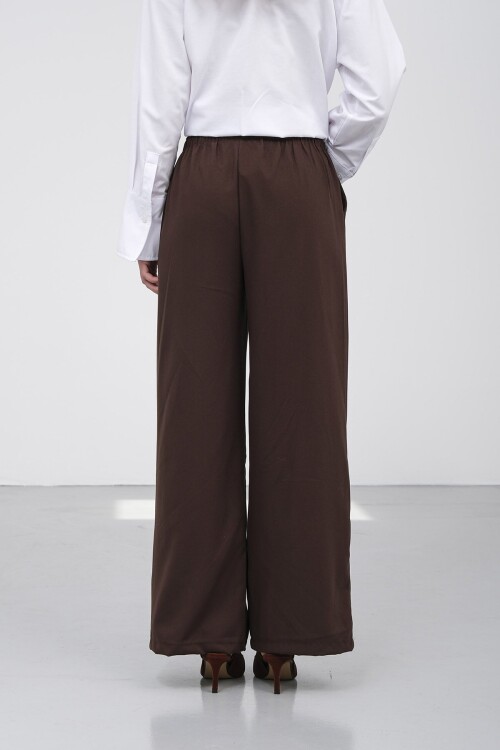 Beli Lastikli Çift Cepli Geniş Paça Pantolon