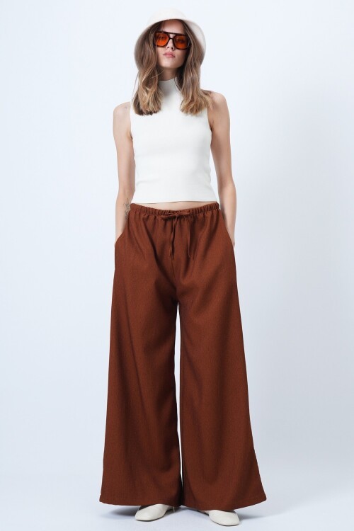 Çift Cepli Bağlama Detaylı Bol Paça Kadife Pantolon