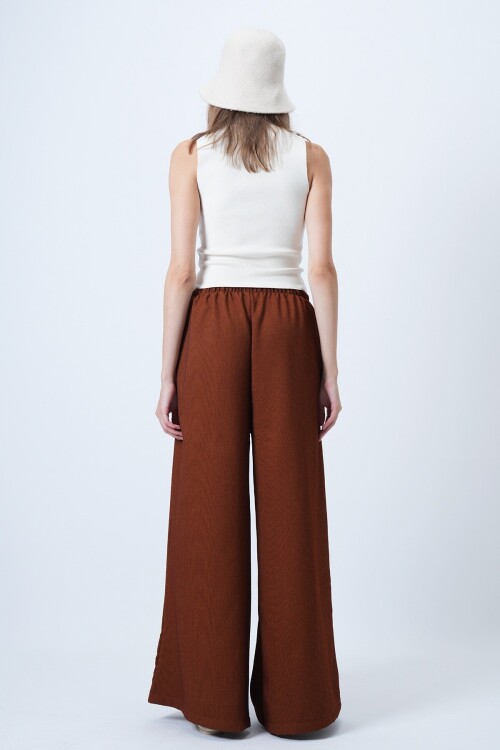 Çift Cepli Bağlama Detaylı Bol Paça Kadife Pantolon