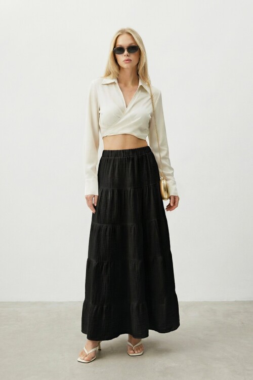 Beli Lastikli Katlı Midi Etek