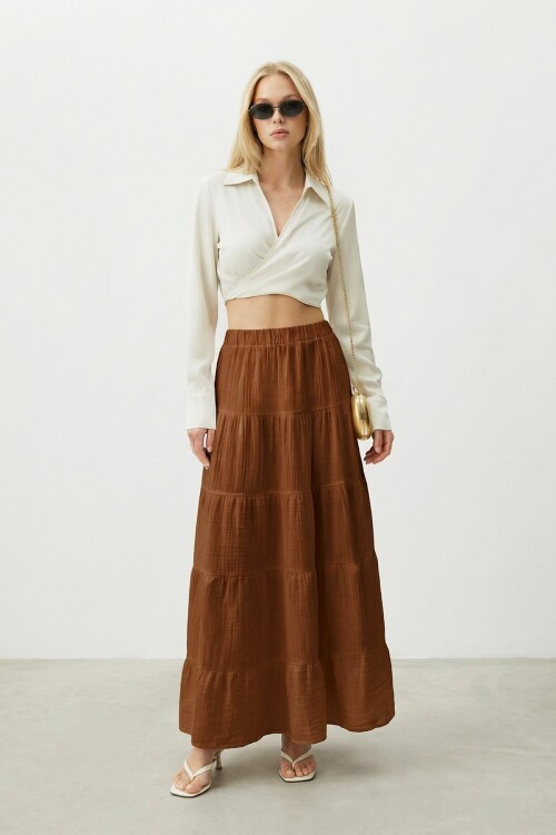 Beli Lastikli Katlı Midi Etek