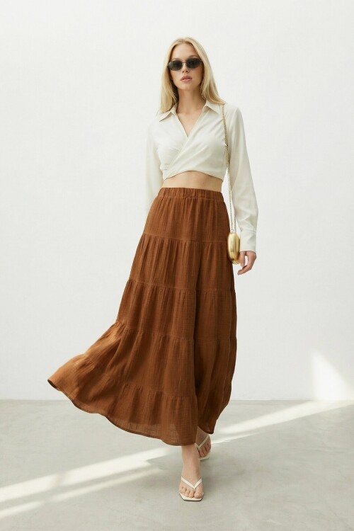 Beli Lastikli Katlı Midi Etek