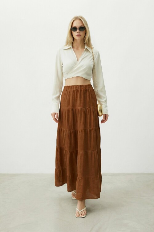 Beli Lastikli Katlı Midi Etek