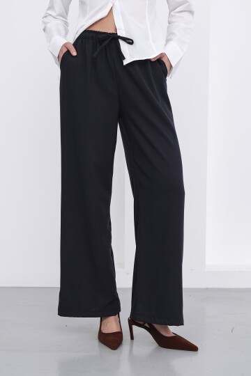 Beli Lastikli Çift Cepli Geniş Paça Pantolon