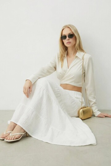 Beli Lastikli Katlı Midi Etek