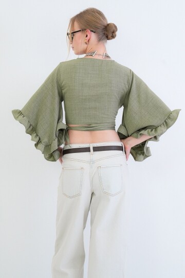 V Yaka Bağlama Detaylı Kolları Fırfırlı Sofia Keten Bluz